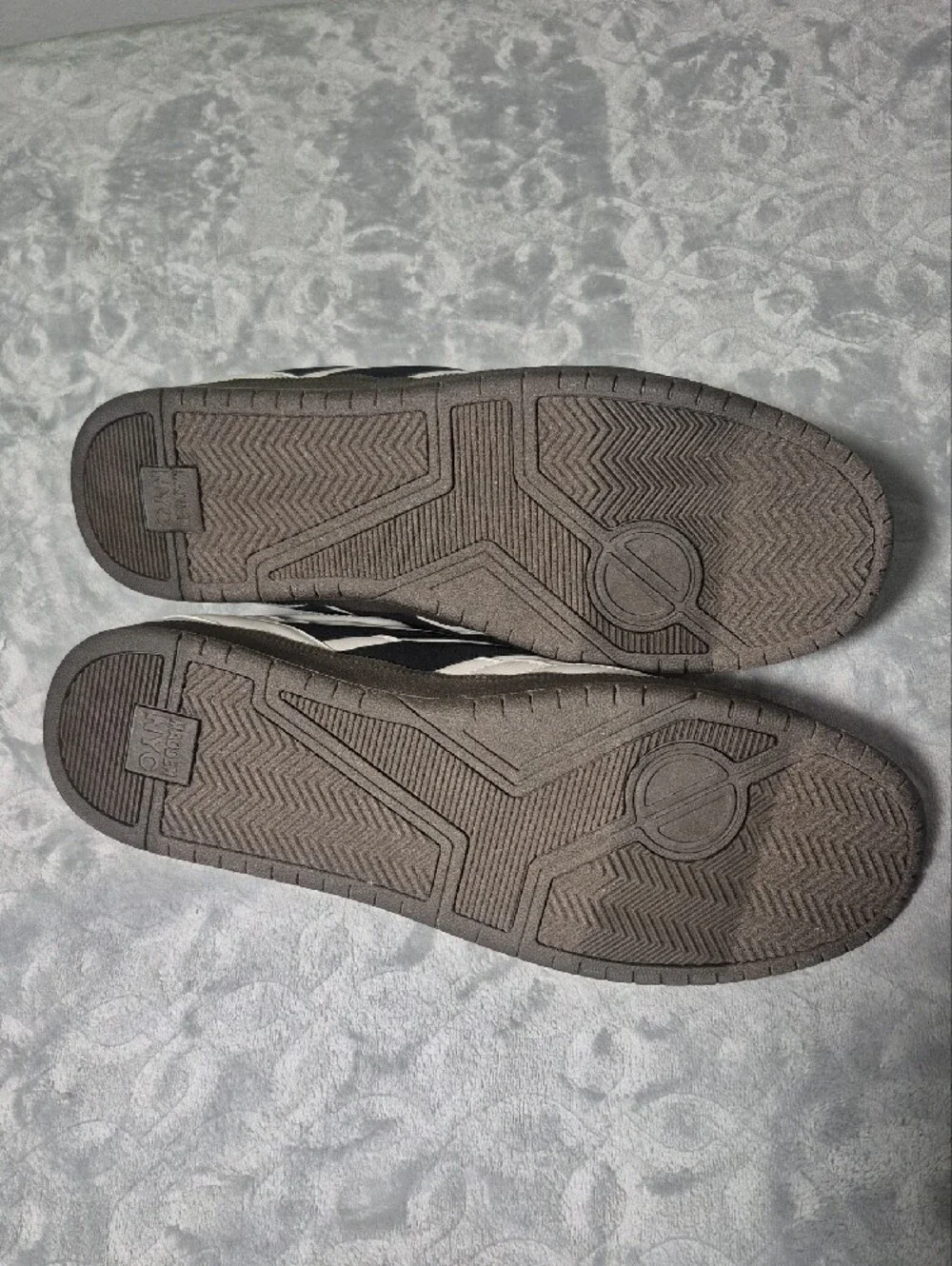 Madden NYC Men’s White Athletic Sneakers with Black Accents